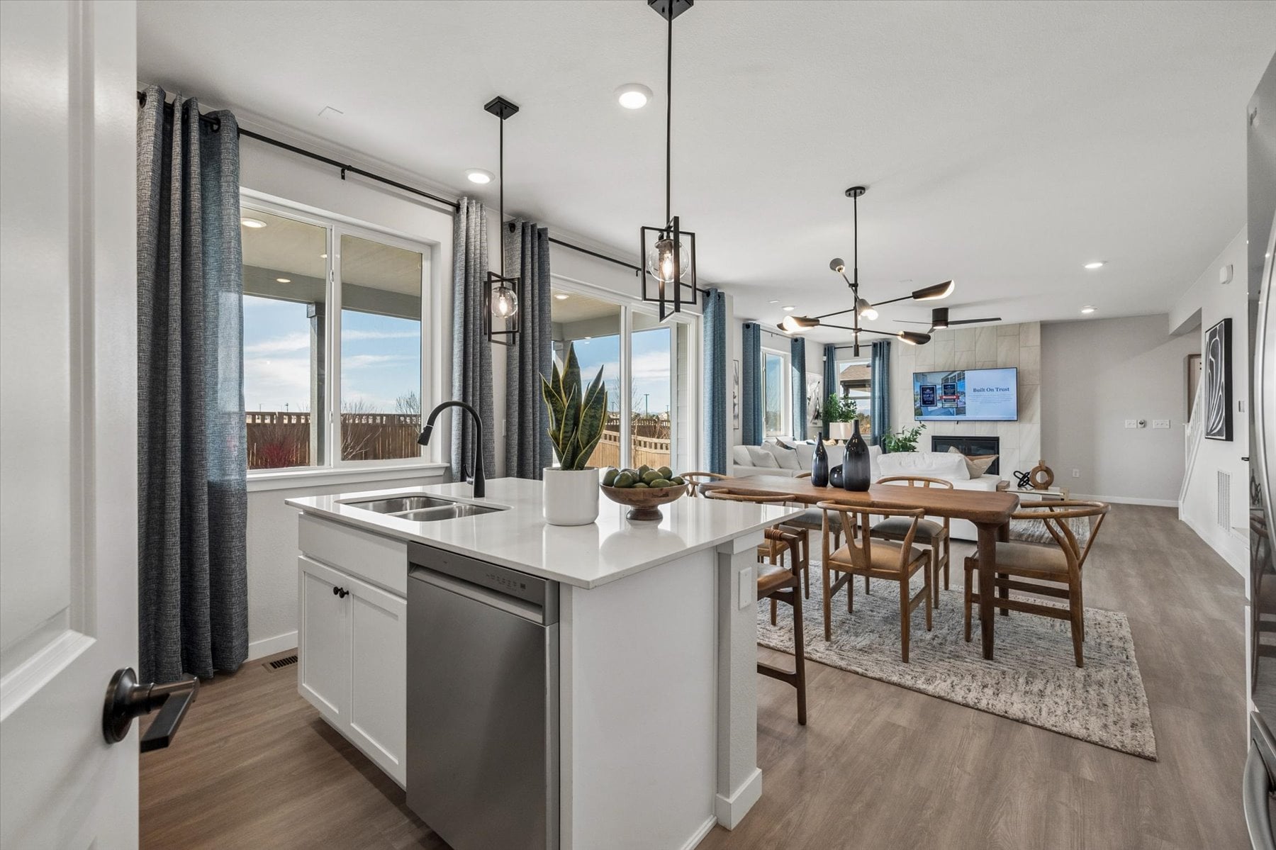 A kitchen with a bar and dining area.