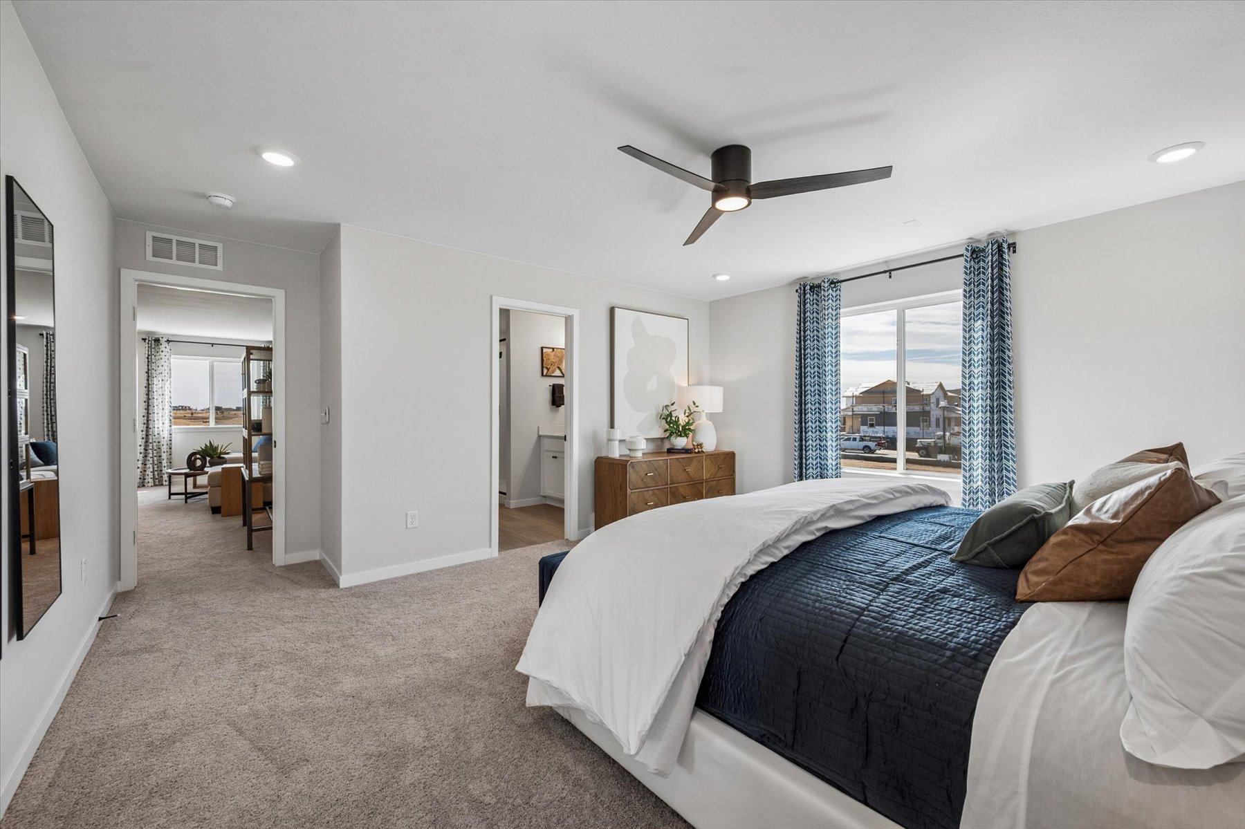 A bedroom with a large bed.