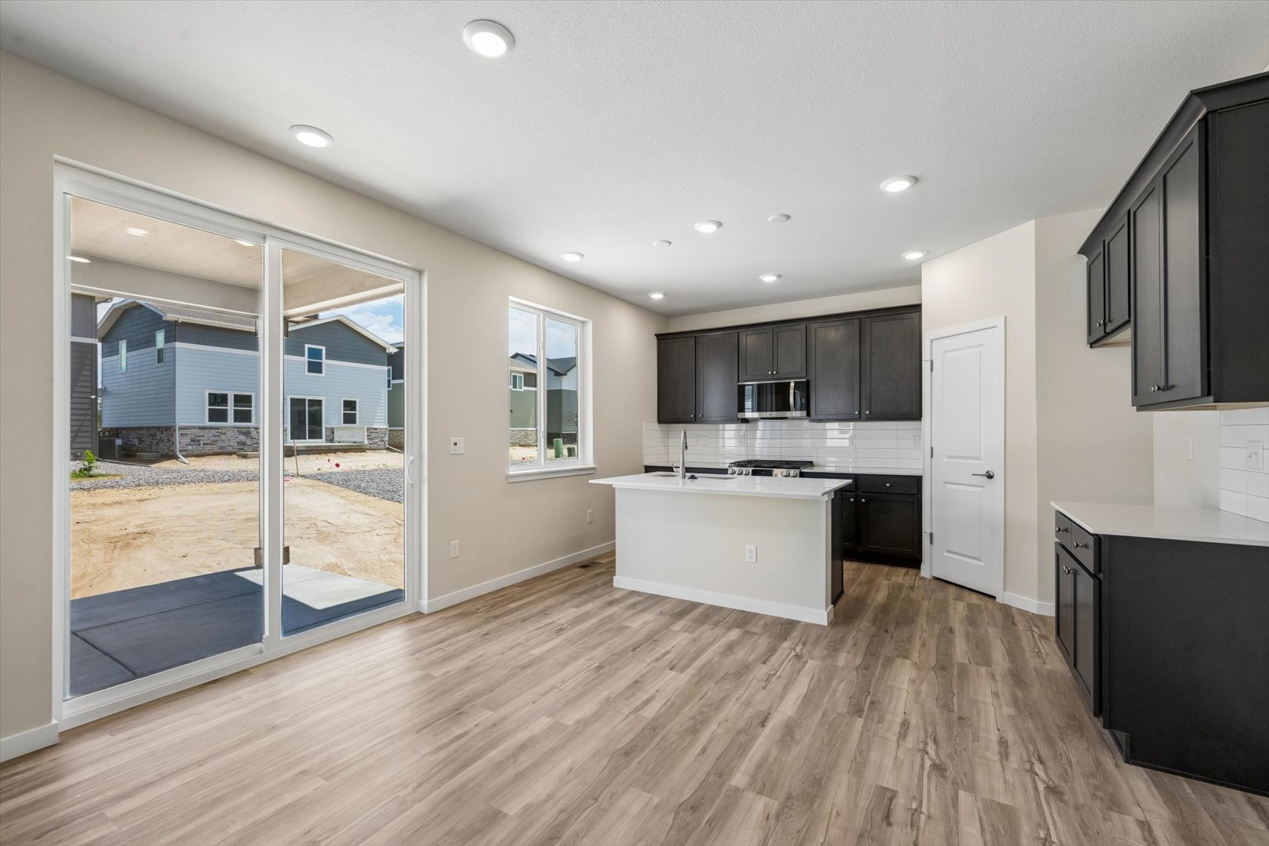 A large kitchen with a pool.