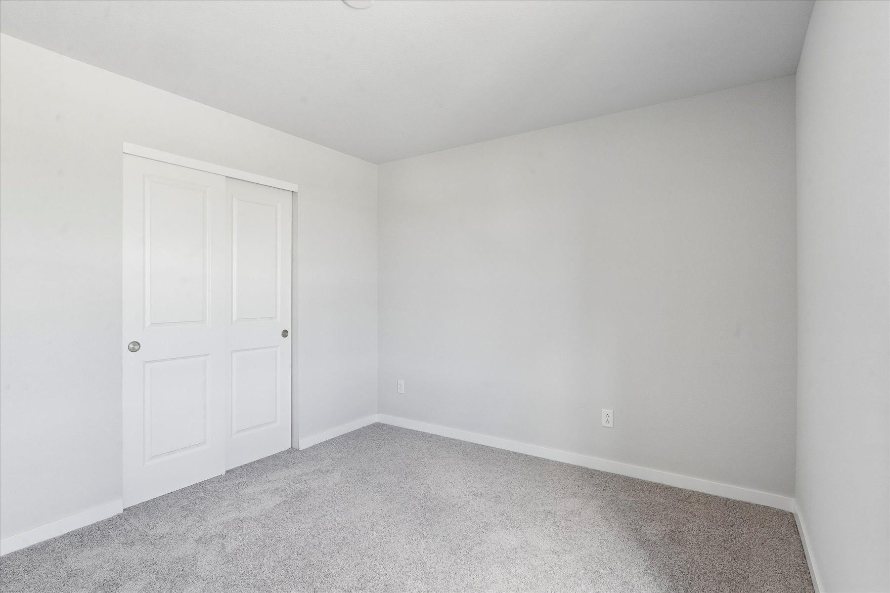 A room with white doors.