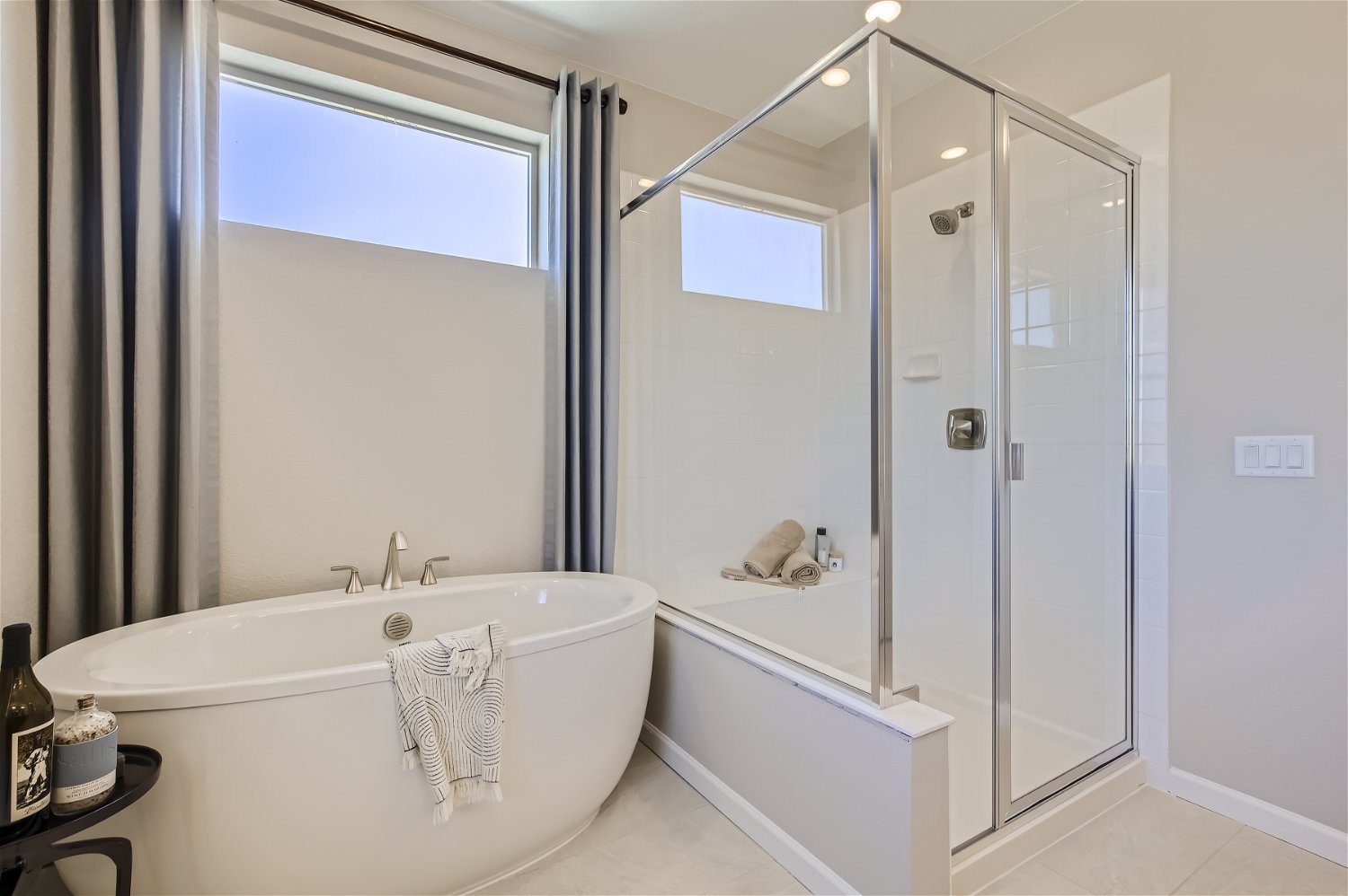 A bathroom with a glass shower.
