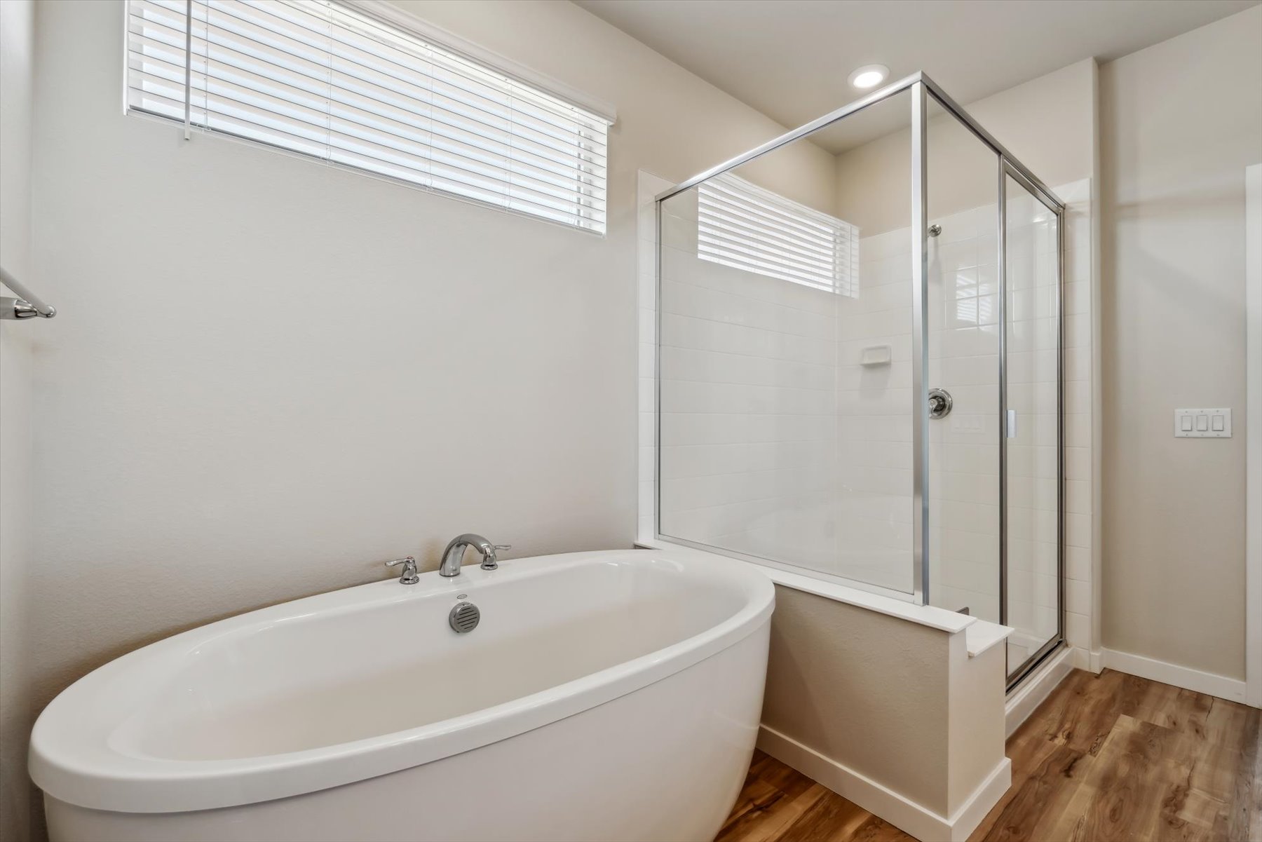 A bathroom with a glass shower.