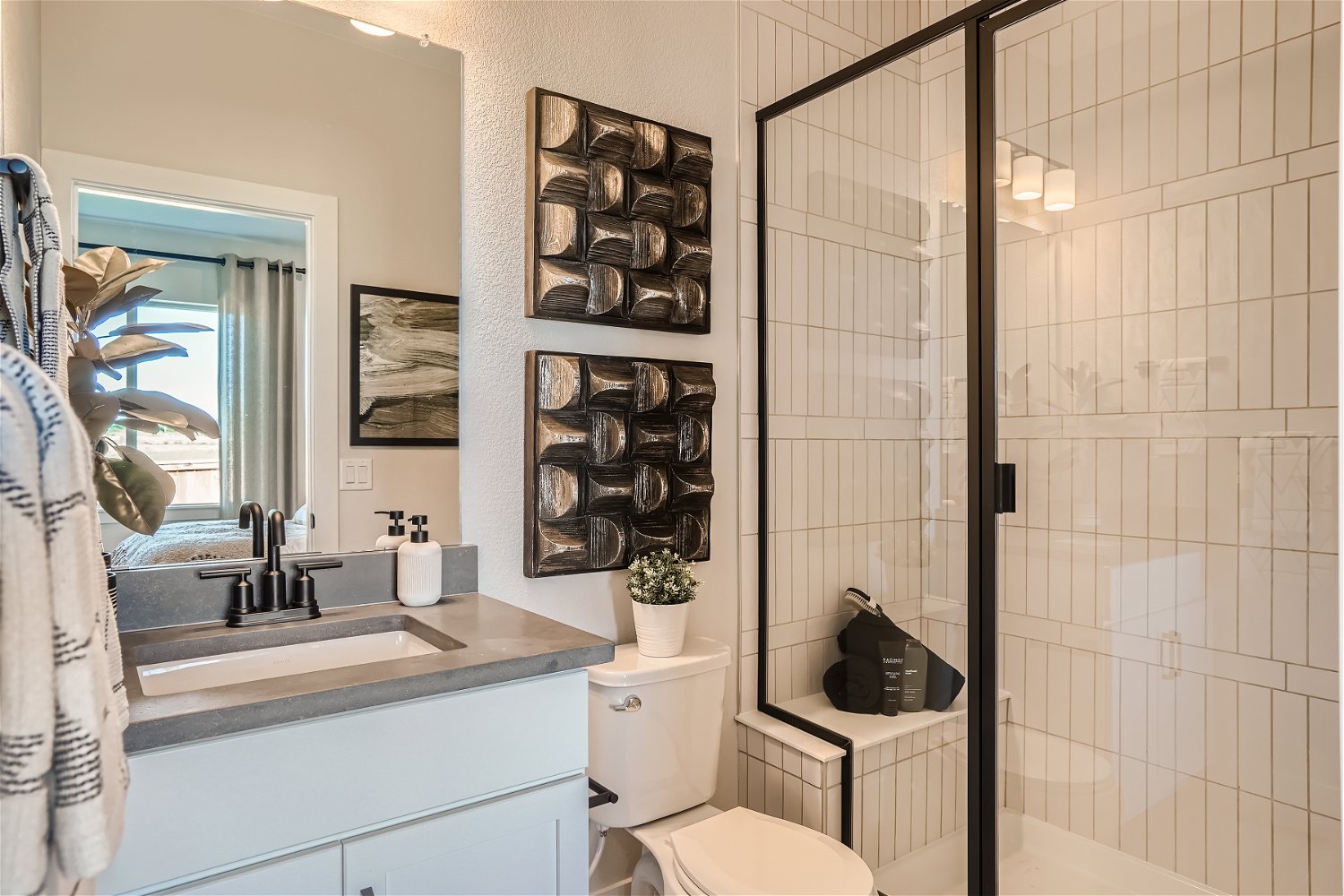 A bathroom with a glass shower.