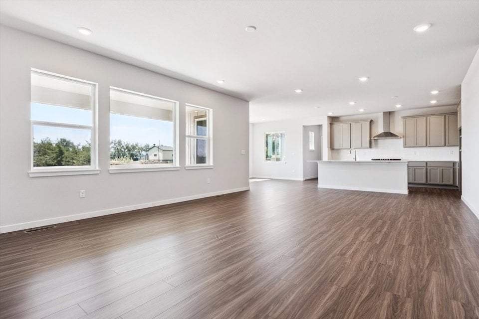 A large empty living room.