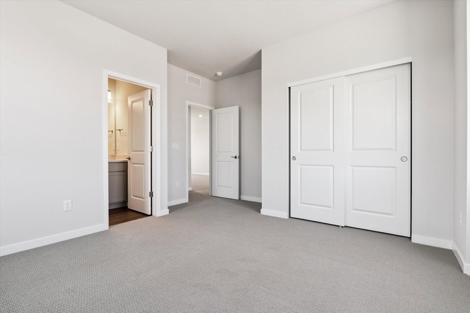 A room with white doors.
