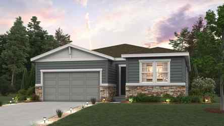 A house with a garage and a lawn in front of it.