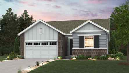 A house with a driveway and a lawn in front of it.