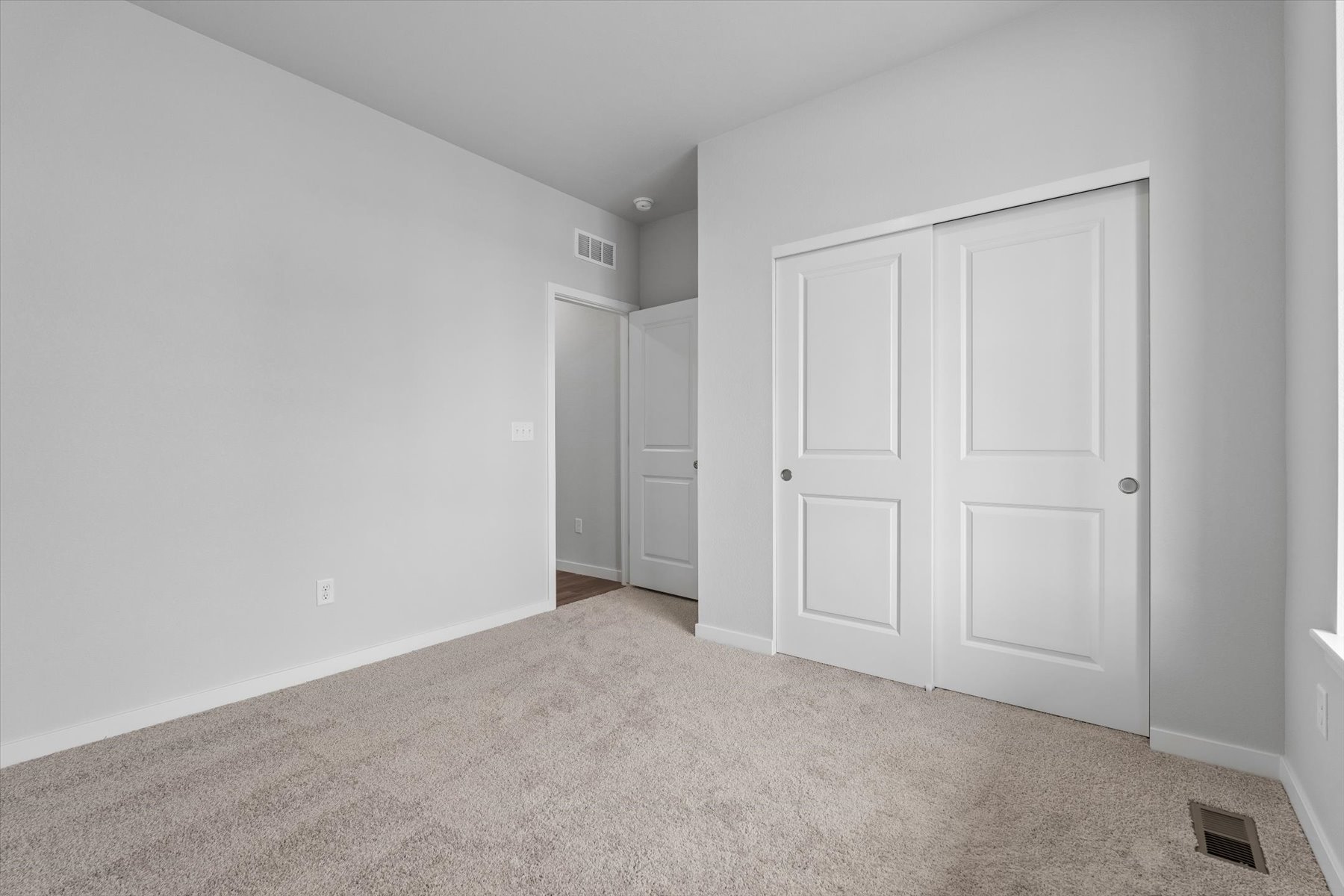 A room with white doors.