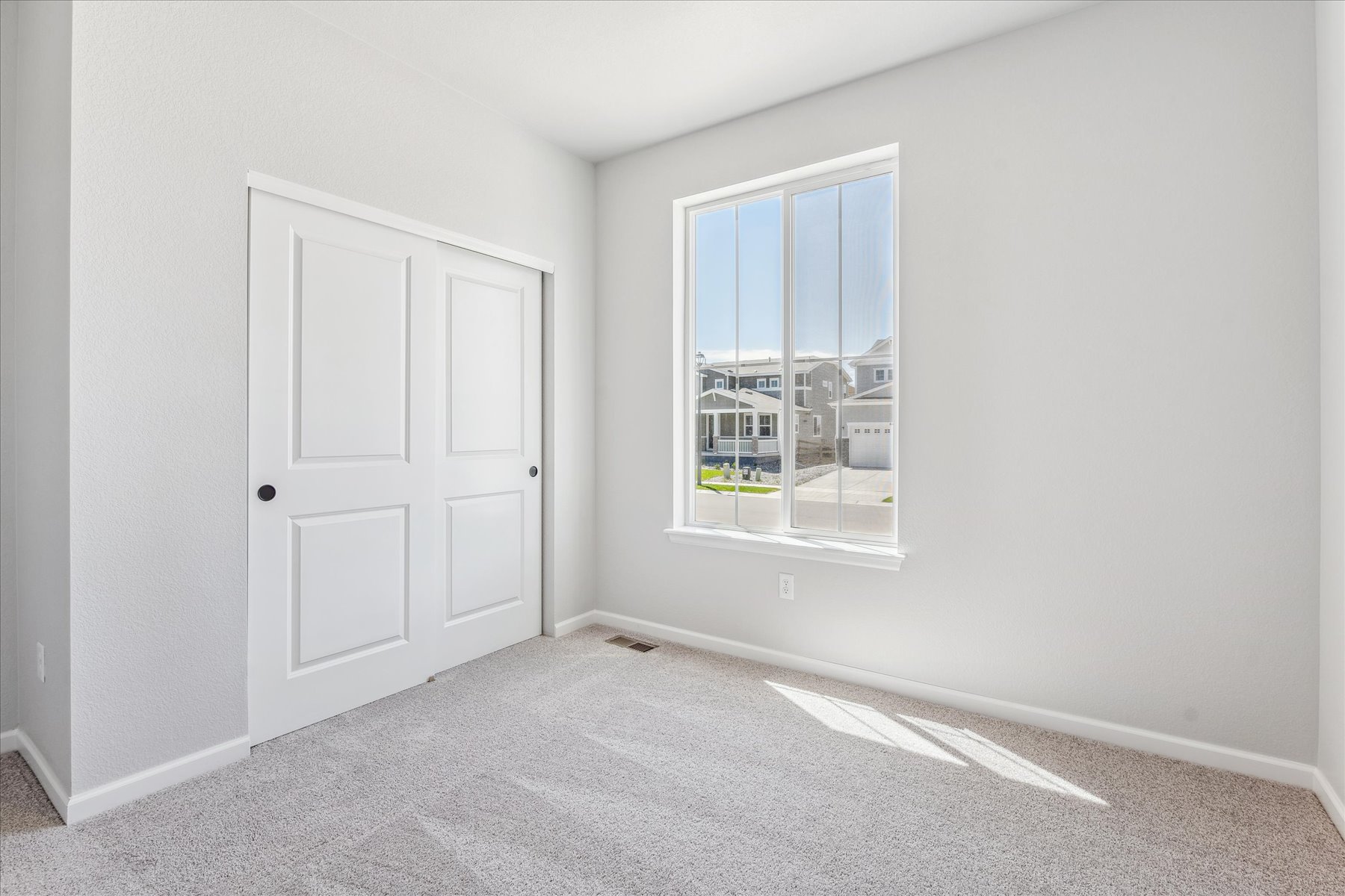 A room with white doors.