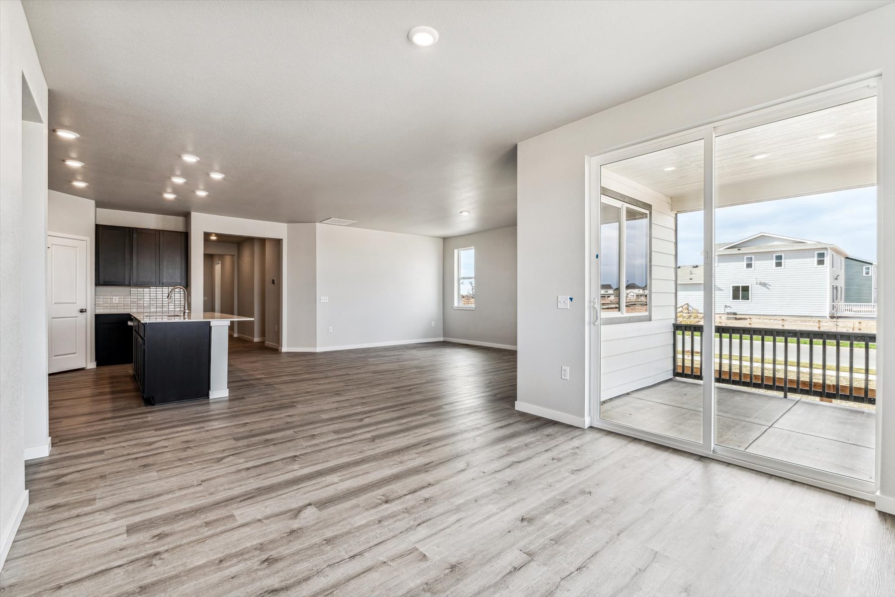 A large room with a wood floor.