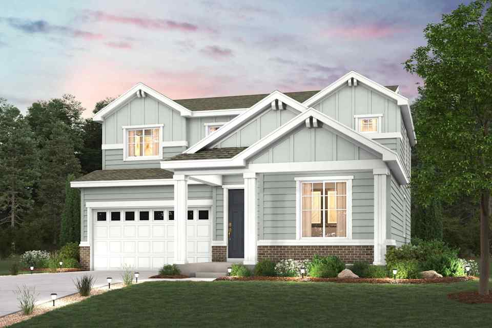 A house with trees in the back.