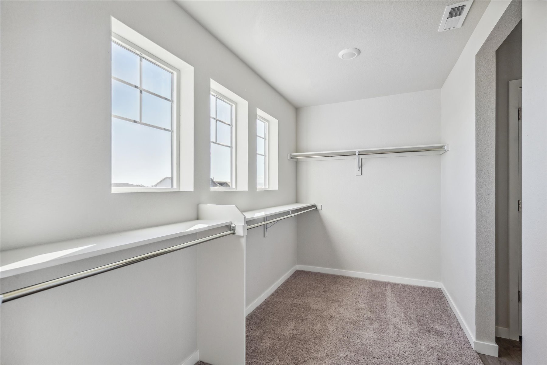 A bathroom with a shower unit.