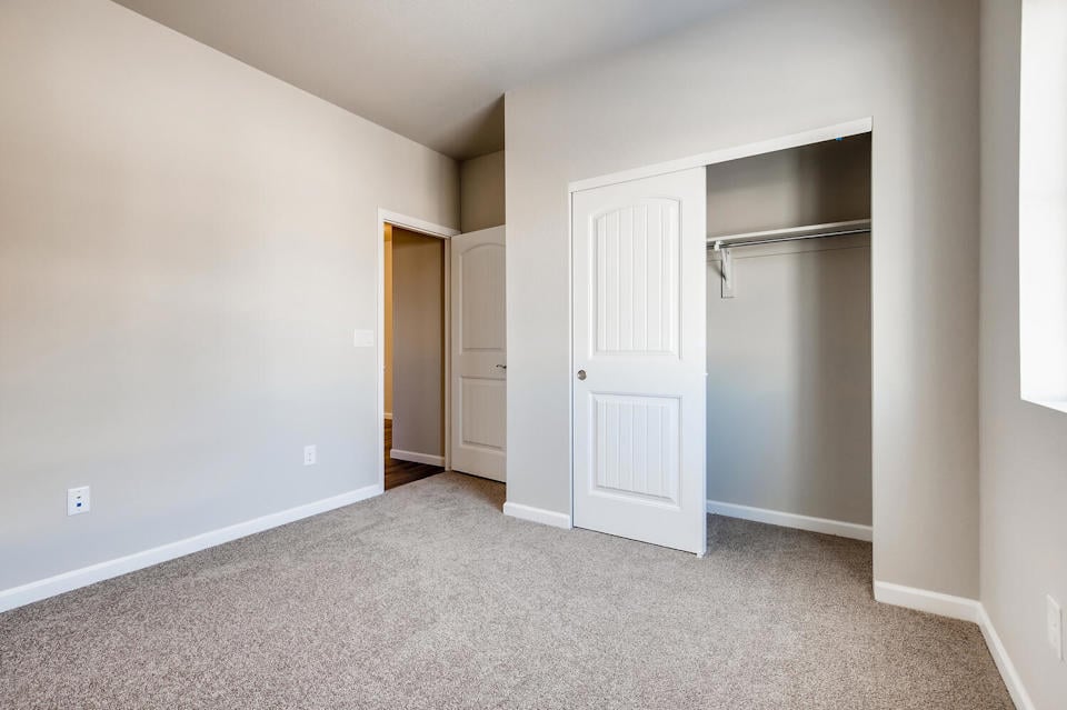 A room with white doors.
