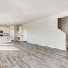 Living room and kitchen of the Fraser floor plan by Century Communities