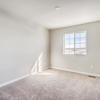 Second floor secondary bedroom of the Fraser floor plan by Century Communities