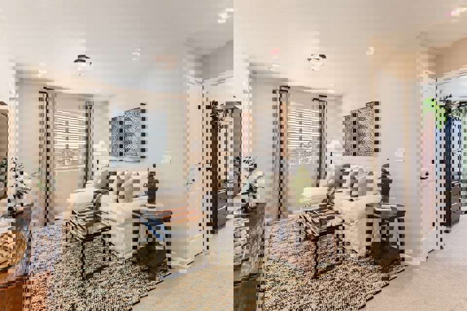 A living room with a couch and coffee table.