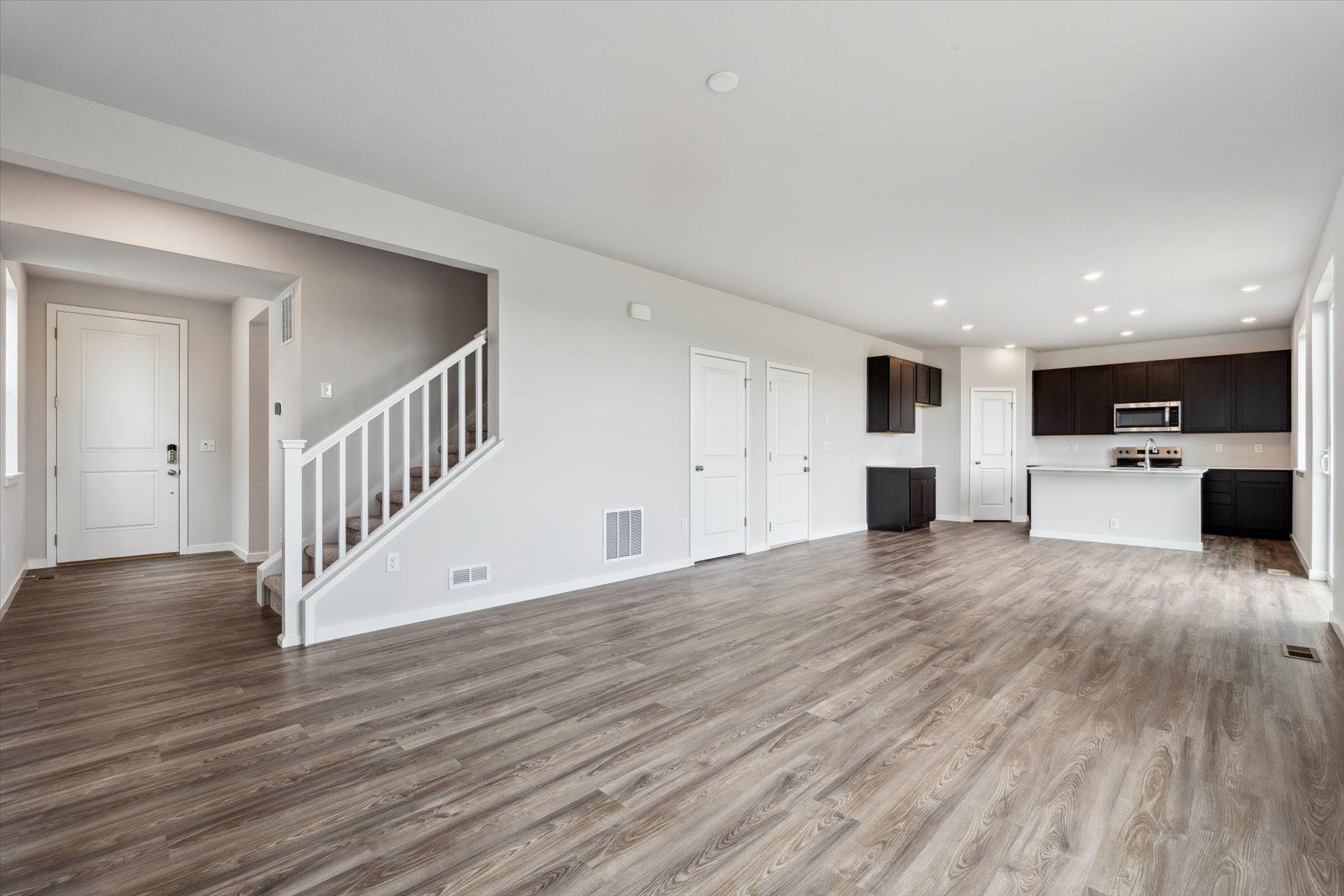 A large empty room with white walls.