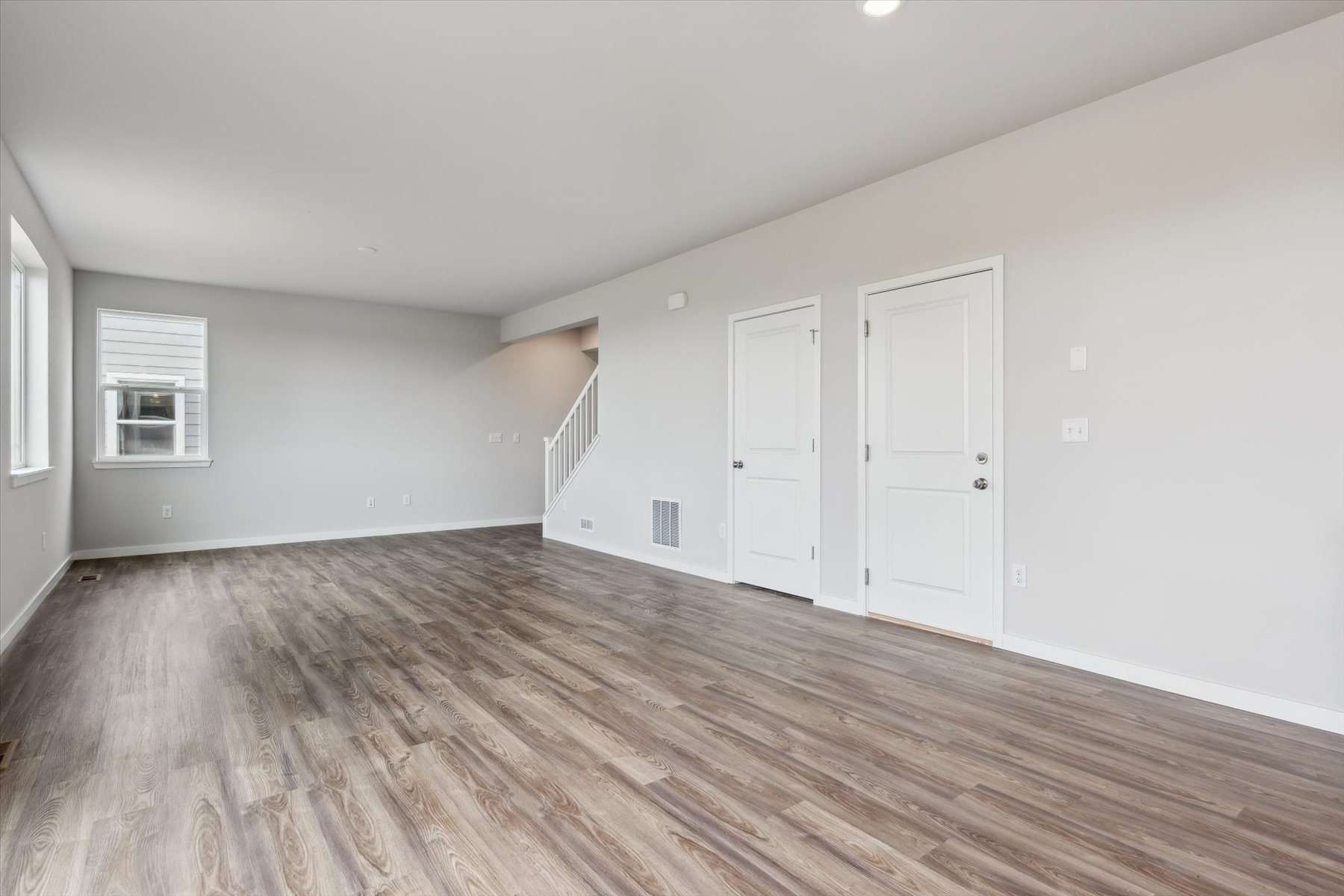 A room with white doors.