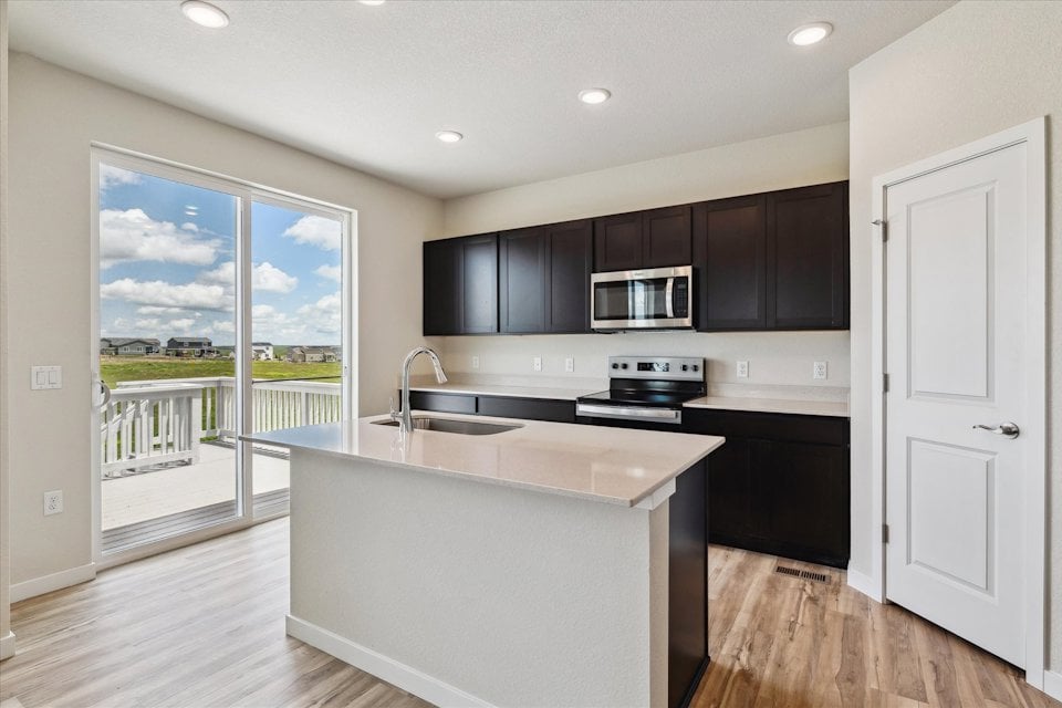 A kitchen with a large island.