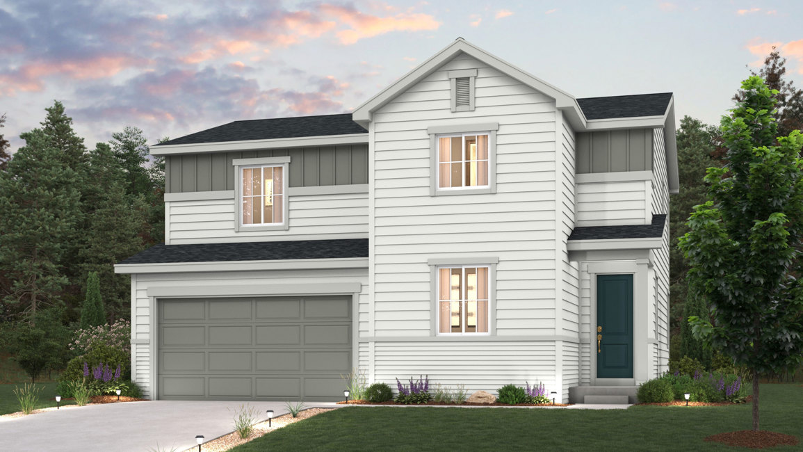 A white house with a garage.
