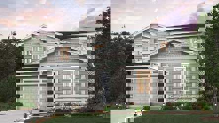 A house with a large front yard.