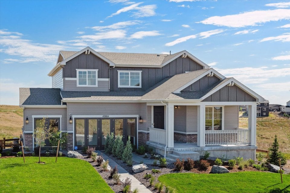 A house with a large front yard.