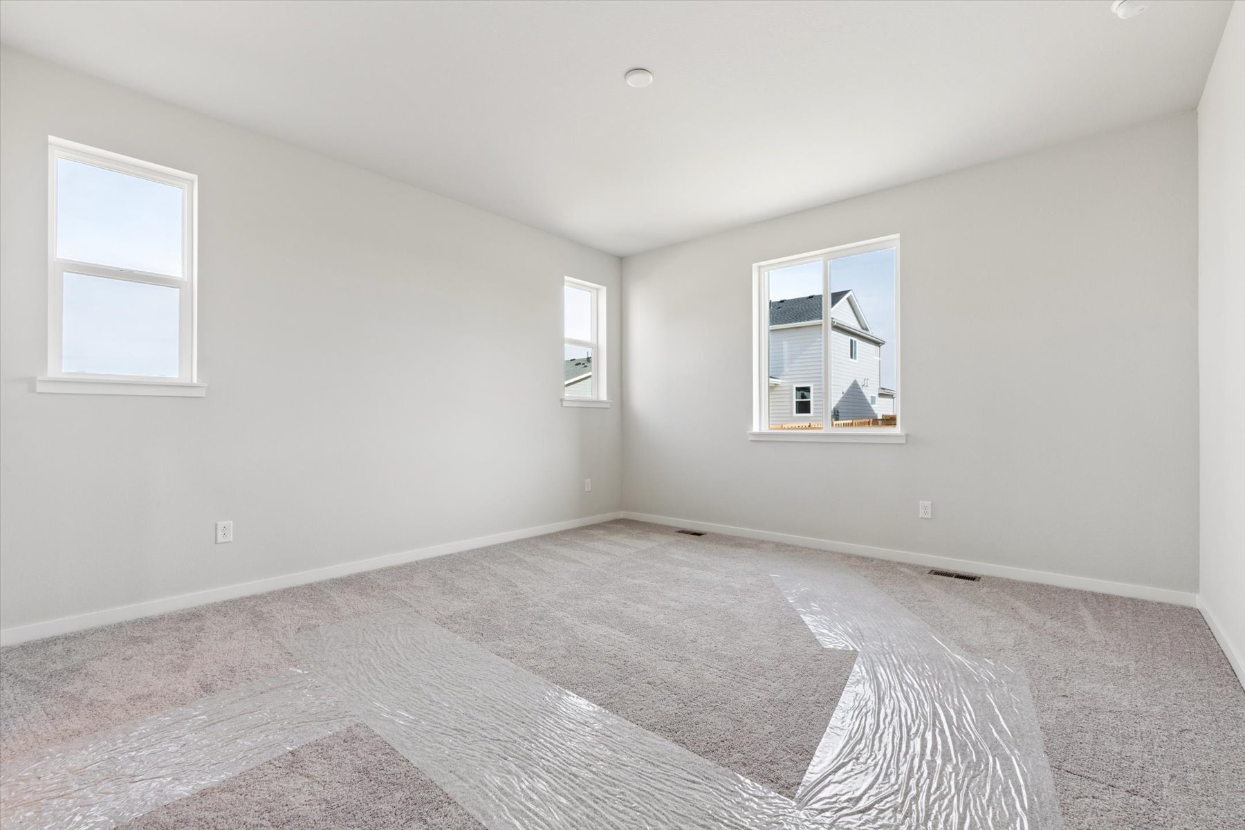 A room with a rug and a rug.