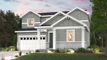 A house with a lawn in front of it.