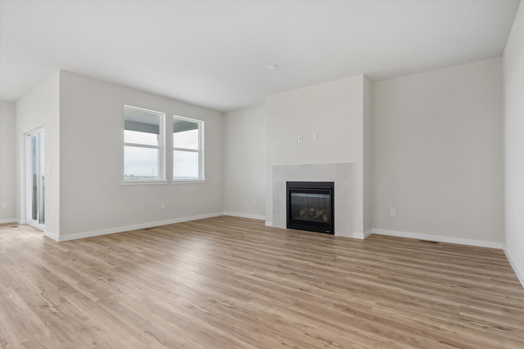 A room with a fireplace.