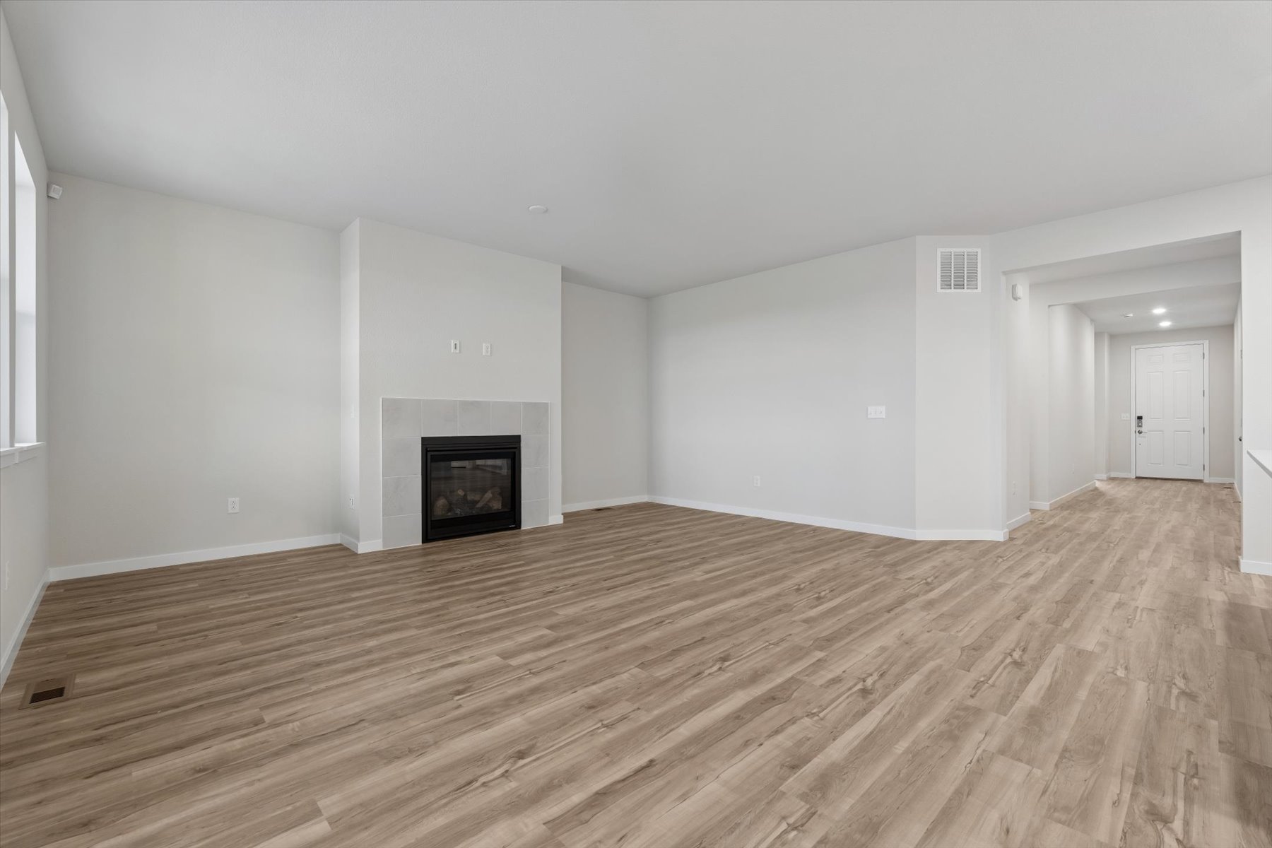 A room with a fireplace.