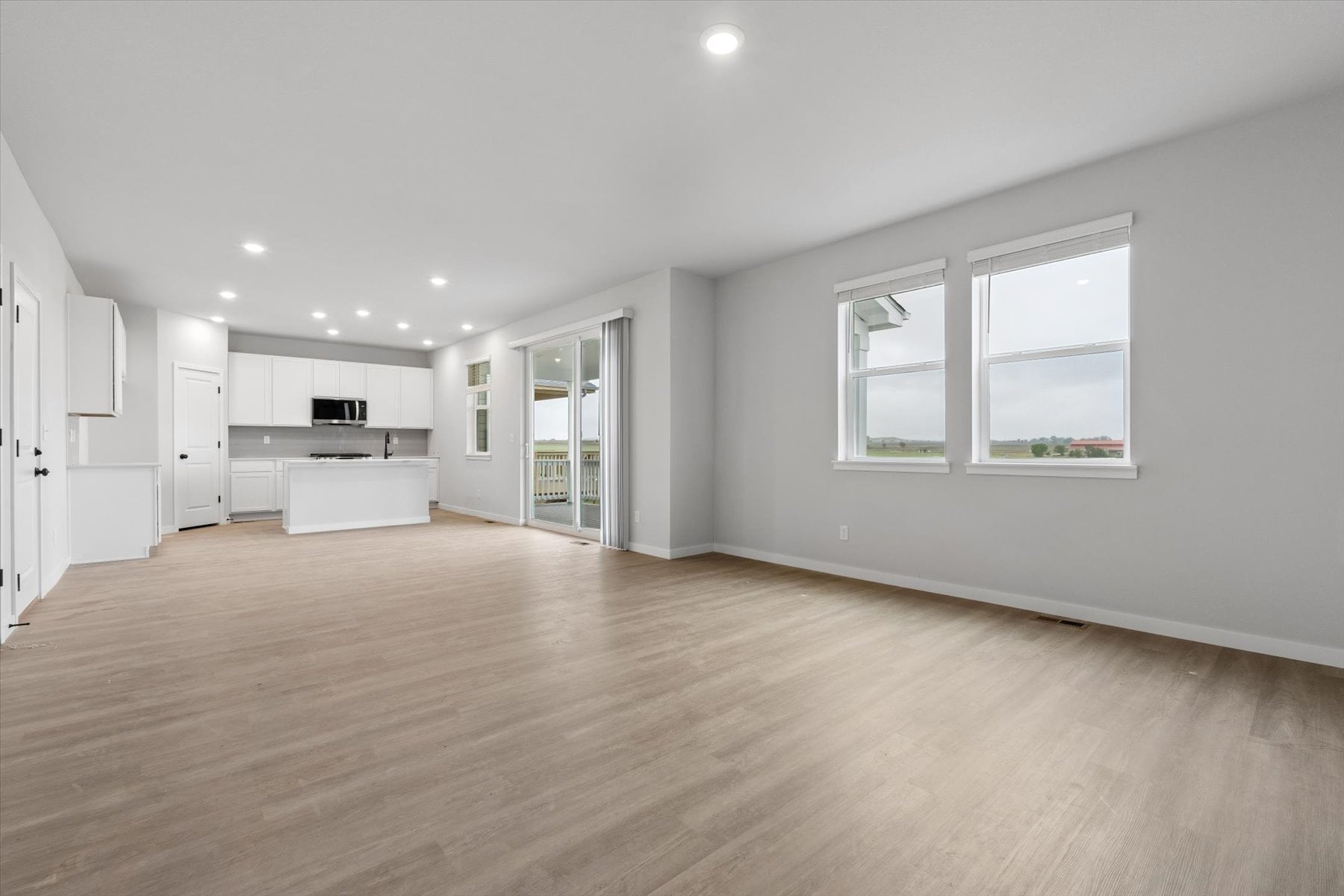 A large empty room with white walls.