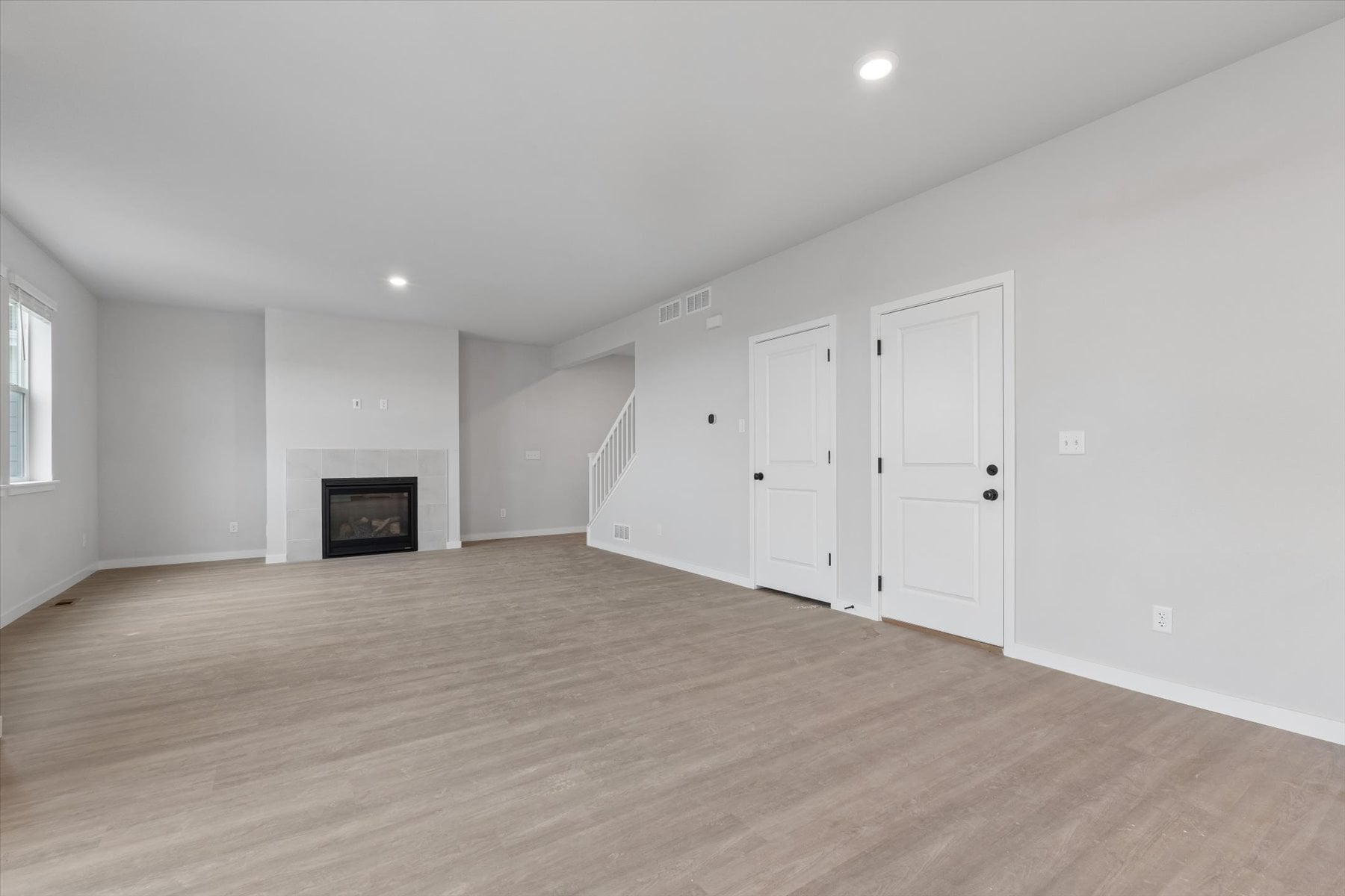 A room with white doors.