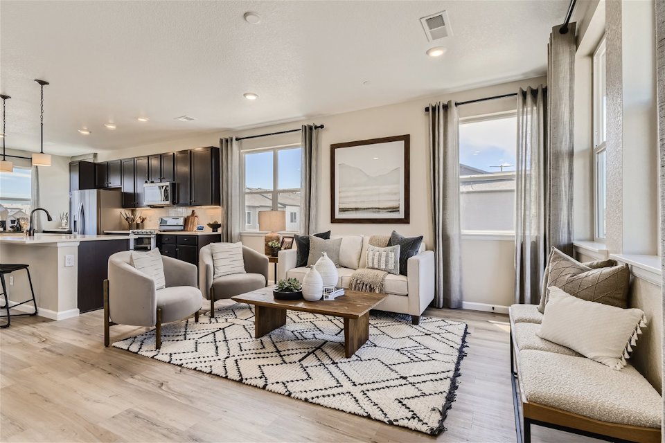 A living room with a large window.