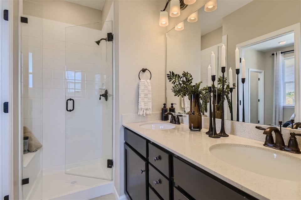 A bathroom with a marble countertop.
