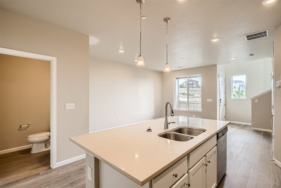A large kitchen with a large island.