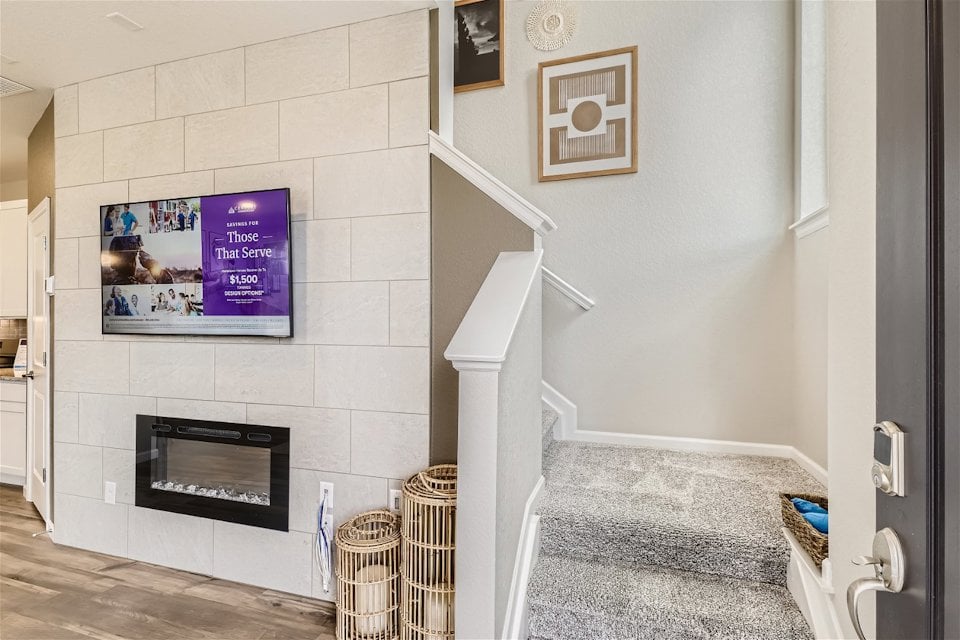 A room with a fireplace and a fireplace.