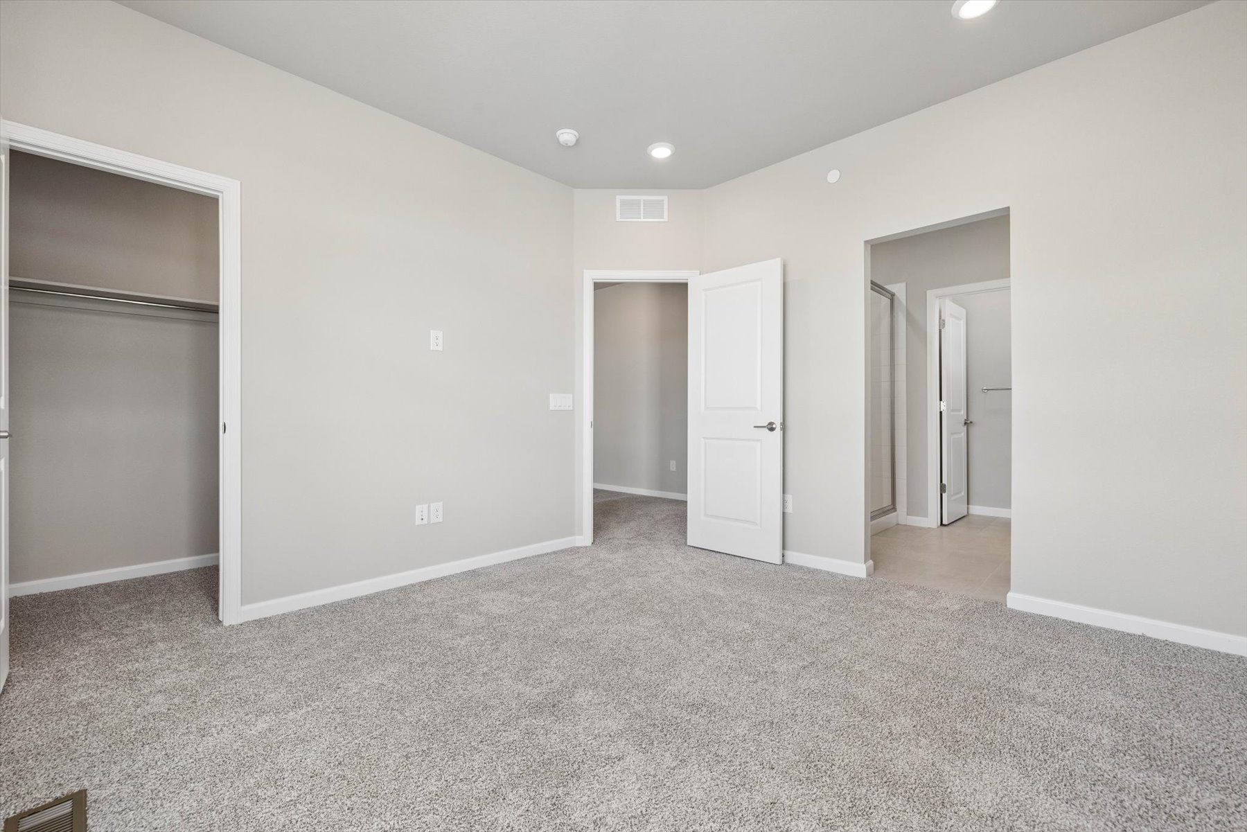 A room with white doors.