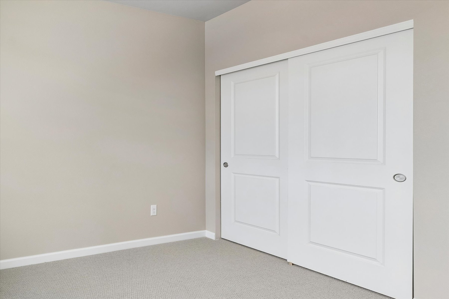 A white door in a room.