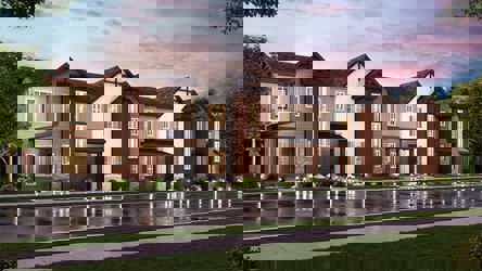 A large house with a pool in front of it.