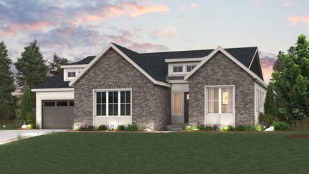 A house with a lawn in front.