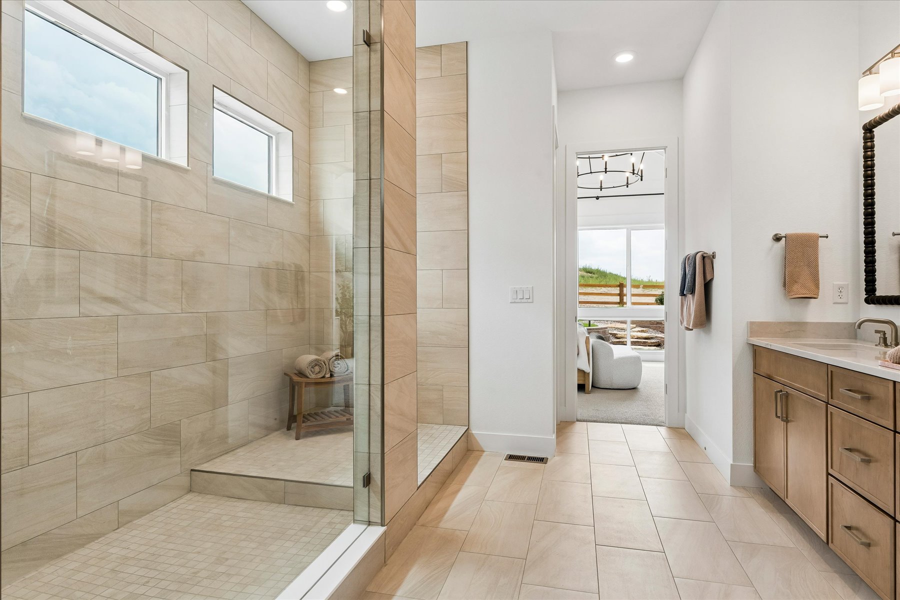 A bathroom with a glass shower.