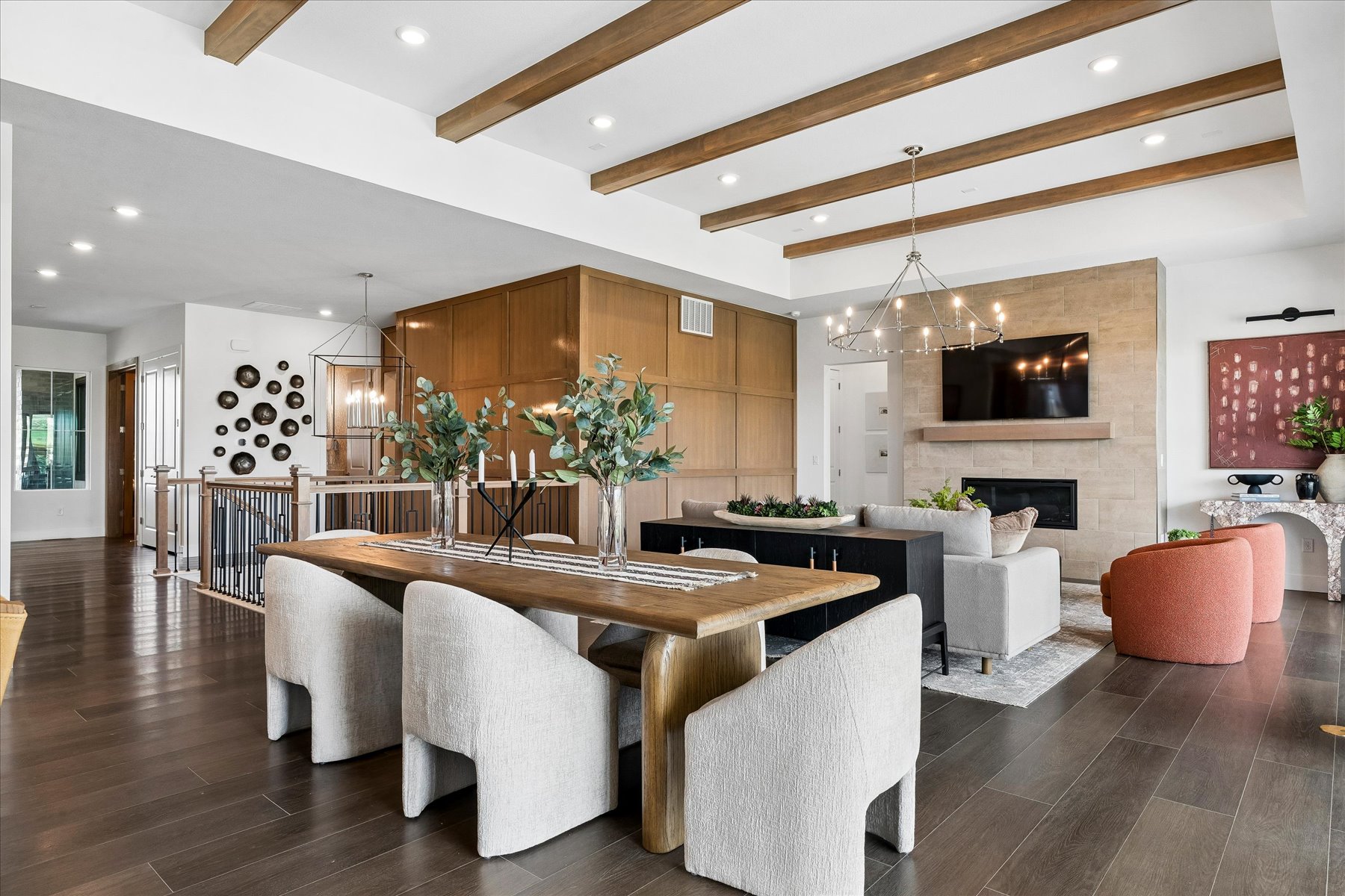 A large dining room with a large table and chairs.