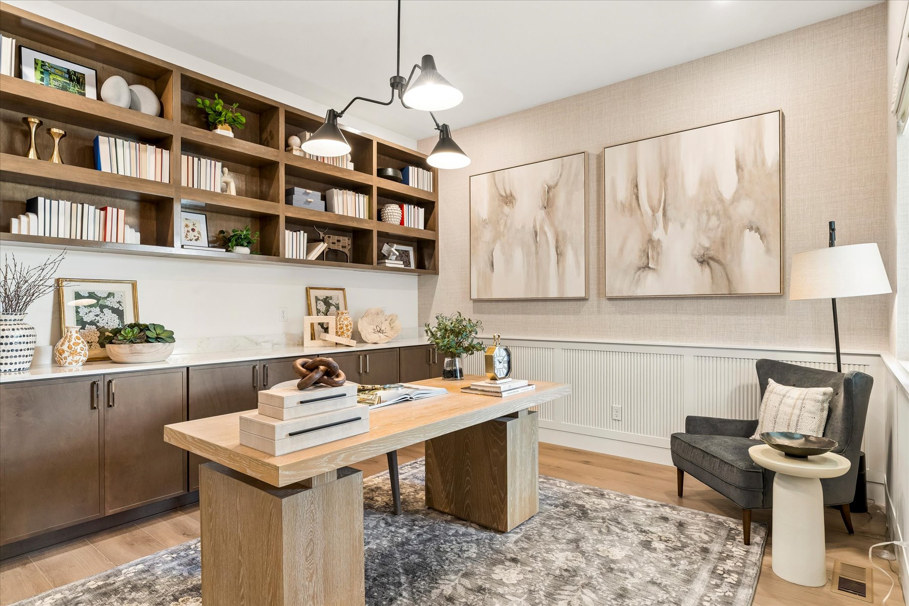 A room with a table and chairs.