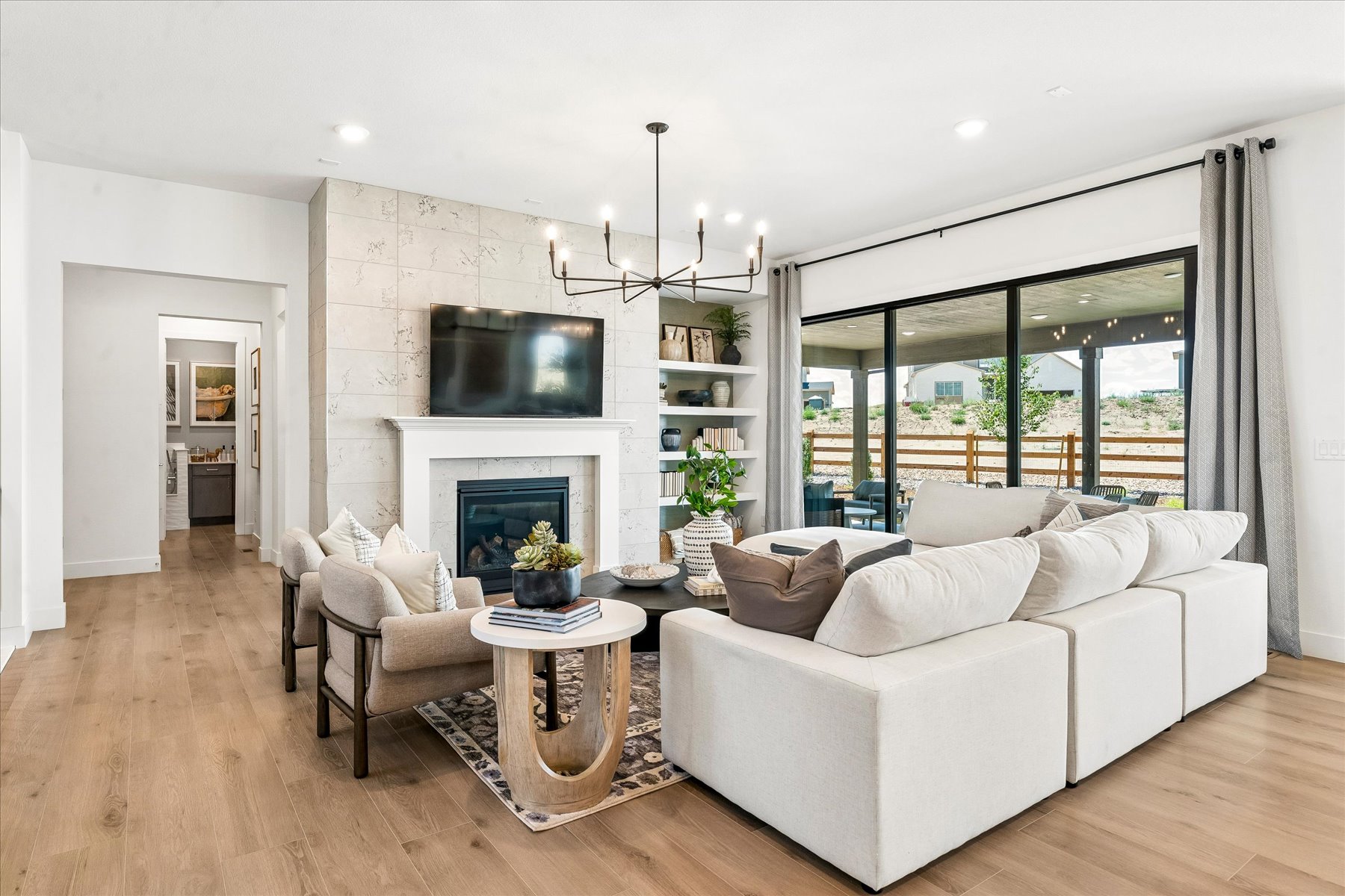 A living room with a fireplace.
