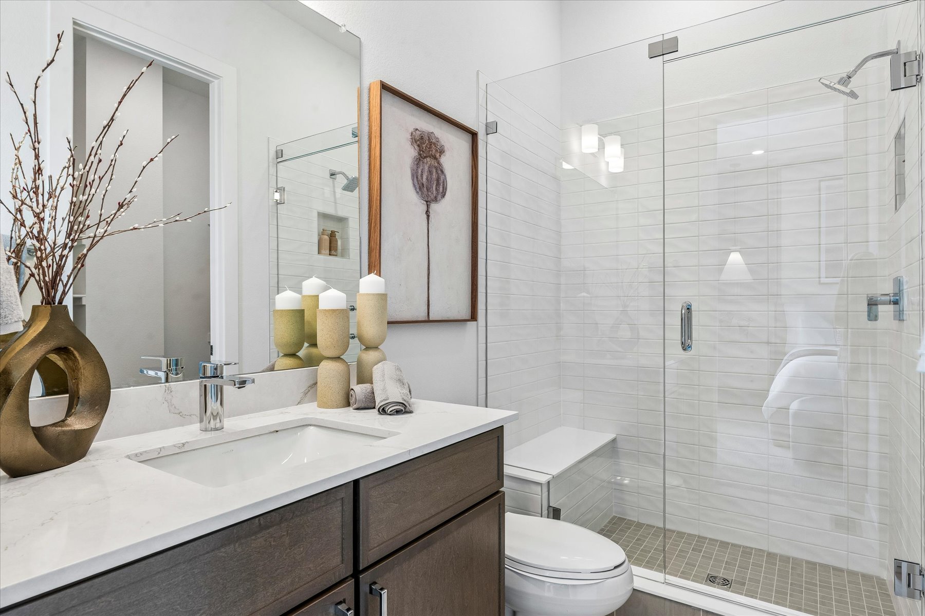 A bathroom with a glass shower.