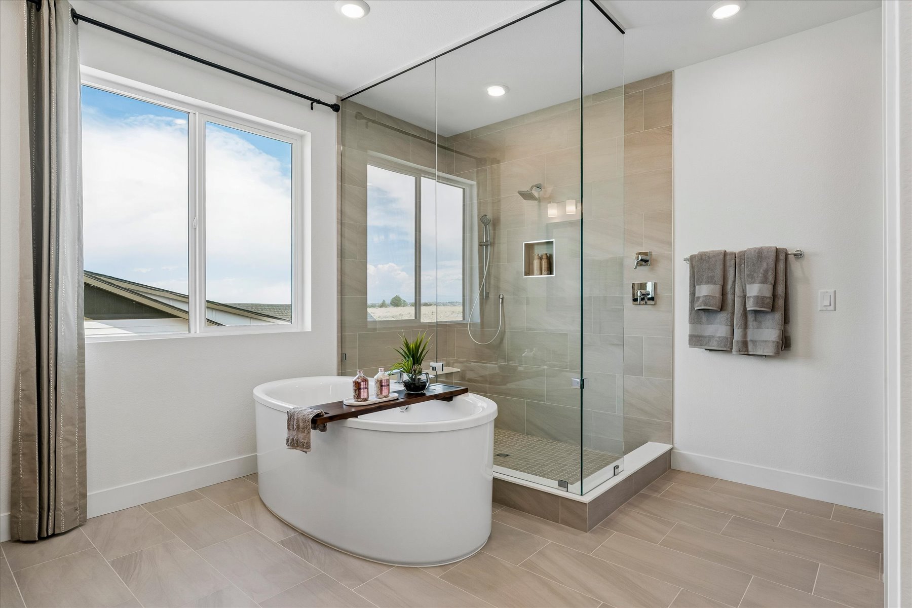 A bathroom with a tub and a sink.