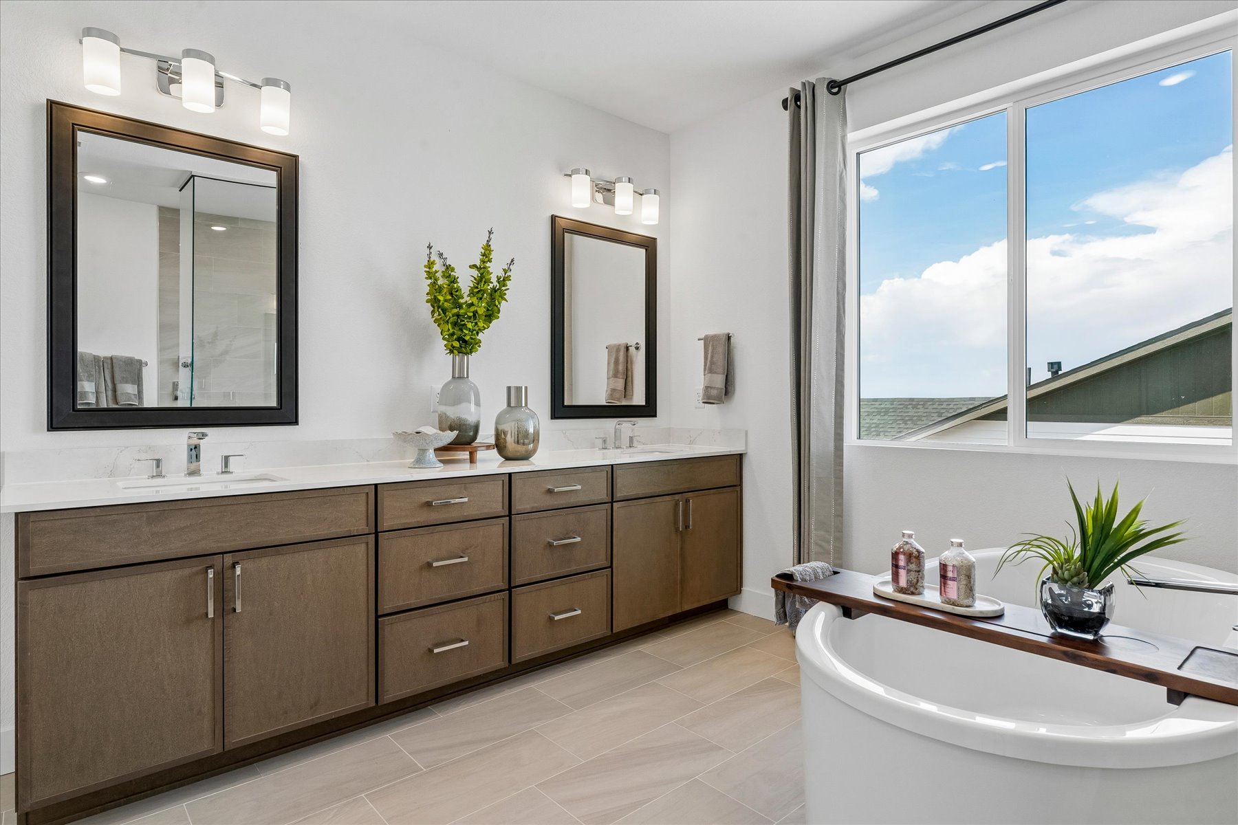 A bathroom with a large window.