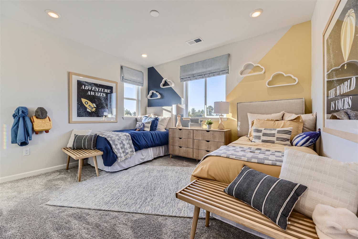 A bedroom with a bed and a couch.