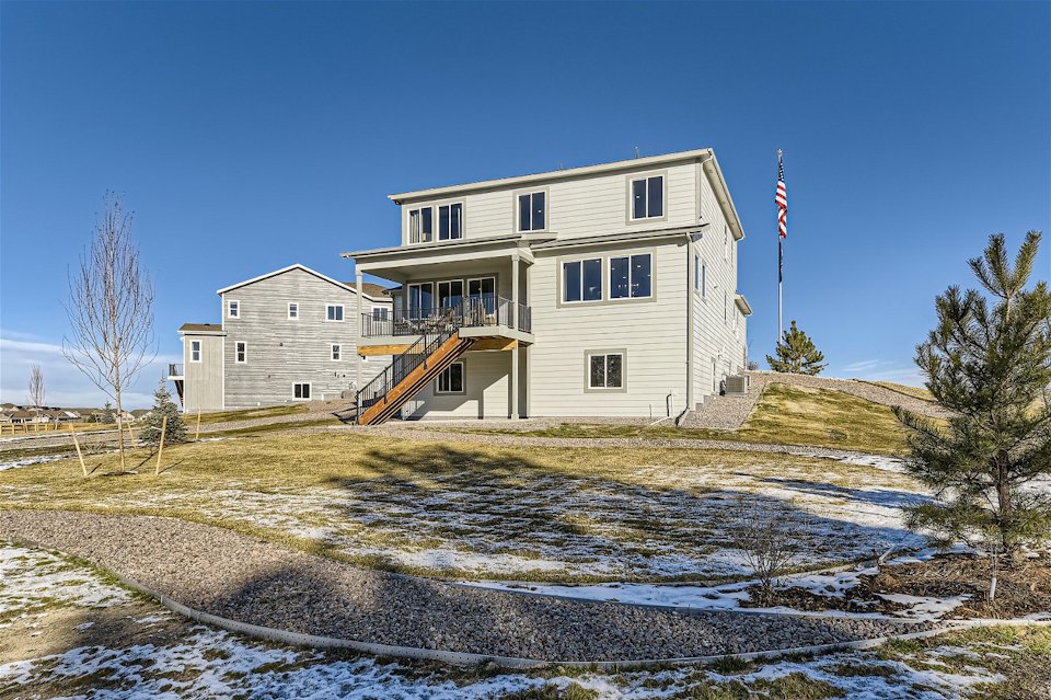 A house with a flag on the roof.