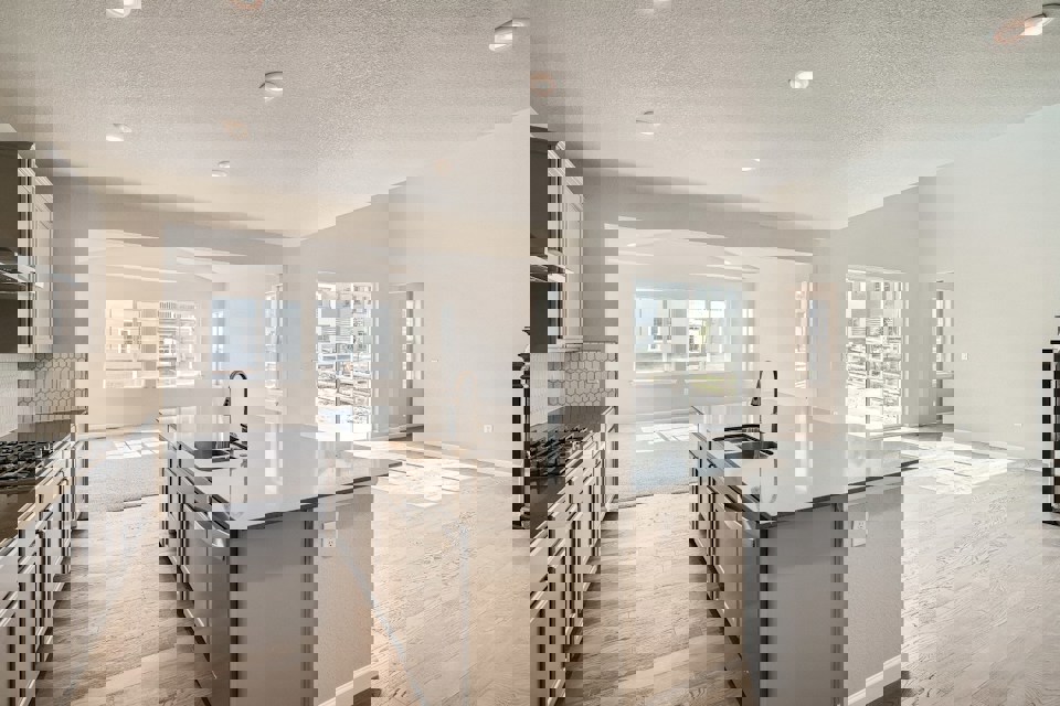 A kitchen with a large island.